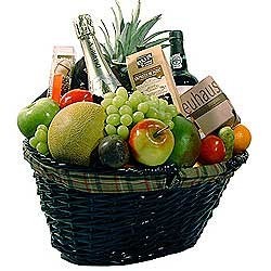 Fruit basket with champagne and wine